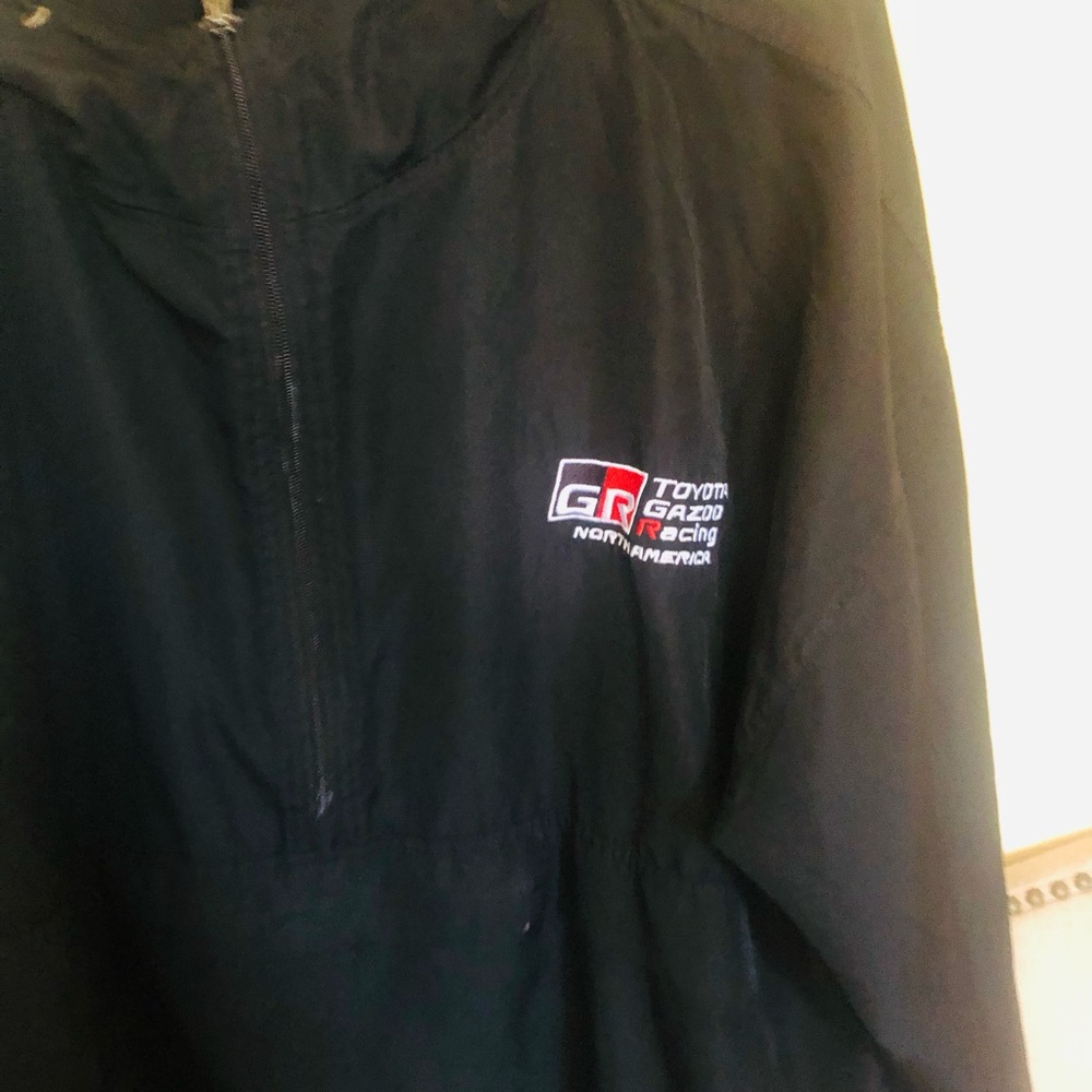 Champion Black Hooded Raincoat with Racing Patch